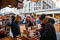 Friends checking out frames at the Christmas market.